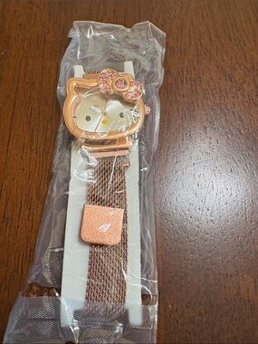Hello Kitty Rose Gold Mesh Band Watch with Crystal Bow Accent